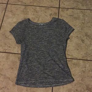 Short, faded gray shirt